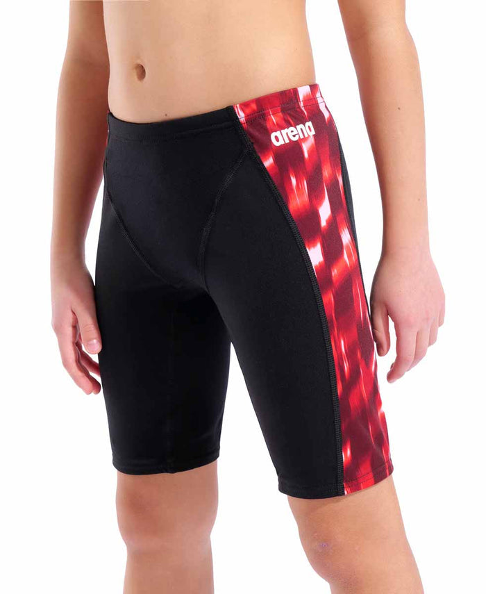 Black and red Arena boys' Wave swim jammer featuring a close-up view of the sleek, fitted design with branding on the side.