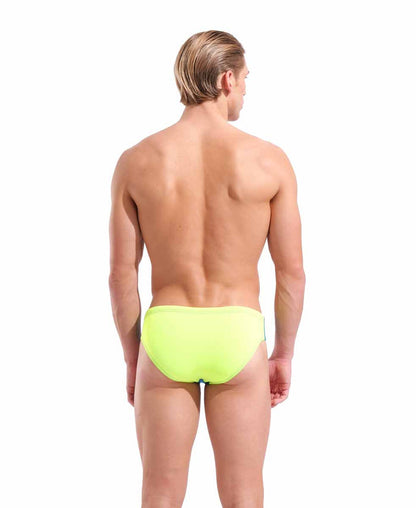 Blue Cosmos and Arctic Lime Arena men's team swim briefs featuring a solid design, made for competitive swimming.
