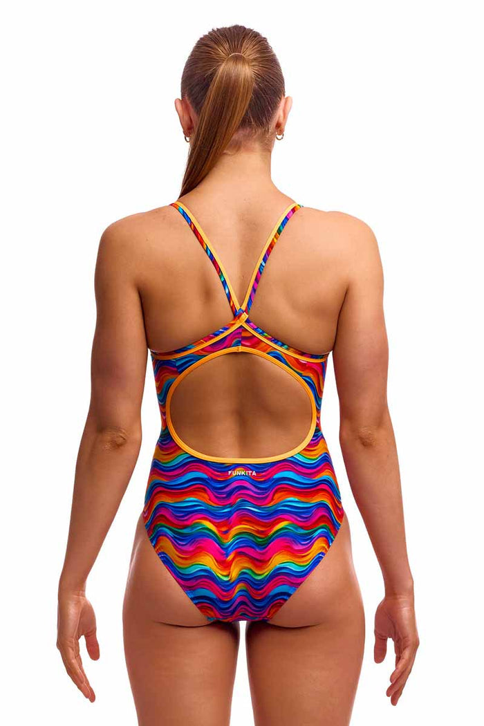 Funkita Ladies Plastic Fantastic diamond back one-piece swimsuit in vibrant multi colors, shown on a model.