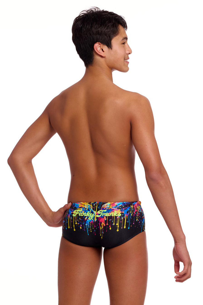 Funky Trunks Boys Killer Cupid Sidewinder trunks in multi with colorful cupid and arrow print, displayed flat on a white background.