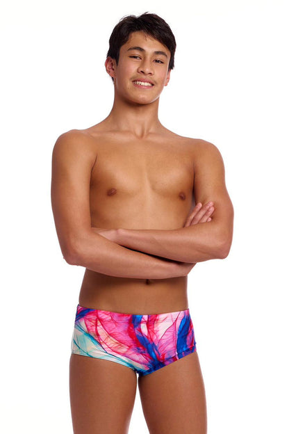 Funky Trunks Boys Muscle Mad Sidewinder trunks featuring colorful, bold patterns and a comfortable fit, designed for active wear.