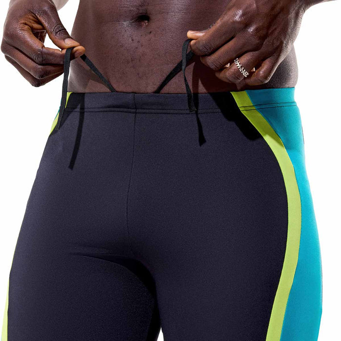 Speedo men's solid splice jammer in anthracite and hyper teal, close-up of the snug fit and vibrant color design